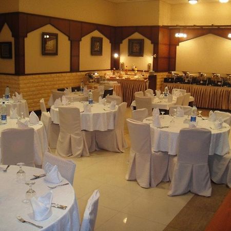 L'Arabia Hotel Apartments Абу-Даби Ресторан фото