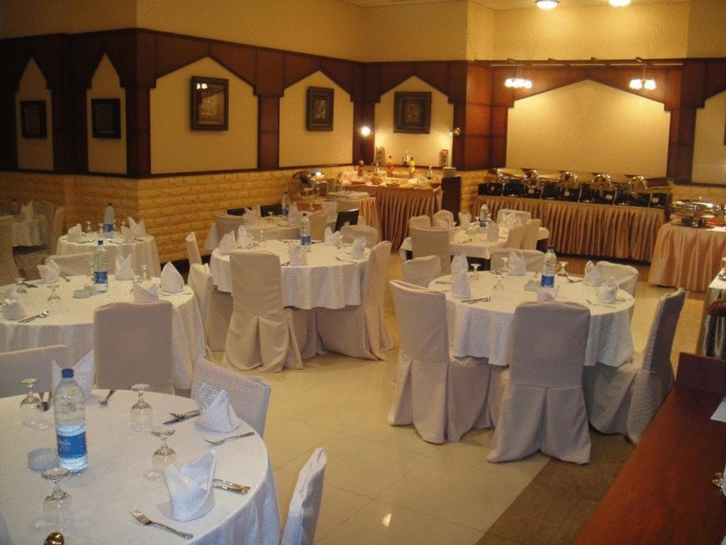 L'Arabia Hotel Apartments Абу-Даби Ресторан фото